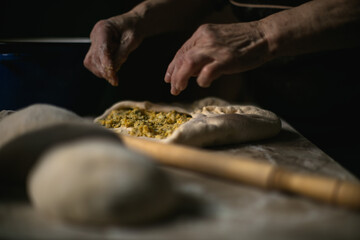 Traditional romanian food and cooking. Preparing dishes for Easter with grandmother.