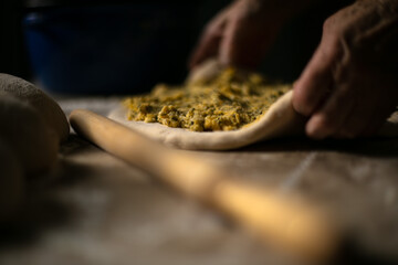 Traditional romanian food and cooking. Preparing dishes for Easter with grandmother.