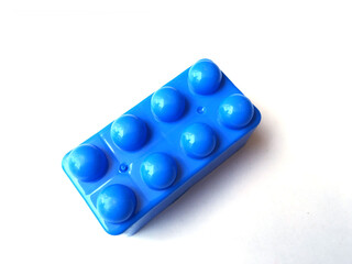 Top view on multi color toy bricks isolated on white  background