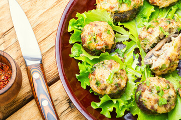 Mushrooms stuffed with minced meat.