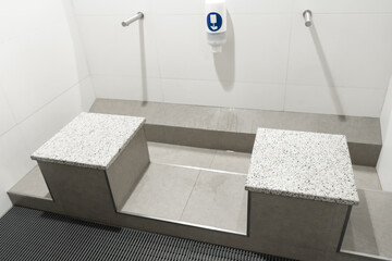 Stylish touchless washstand in a public toilet.