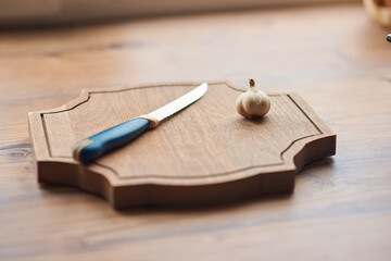 a man washes, cleans and cuts vegetables. Tomatoes, garlic, herbs