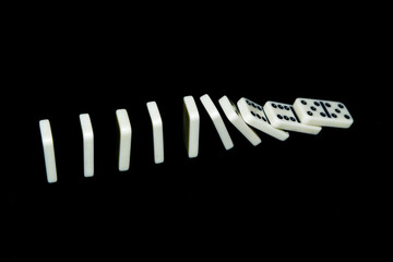 Dominoes on a black background.