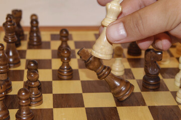 Chess move on a chessboard.