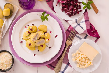 Potato gnocchi stuffed with radicchio and ricotta.
