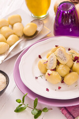 Potato gnocchi stuffed with radicchio and ricotta.
