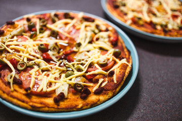 plant-based food, vegan homemade pizzas with veggies and dairy-free cheese