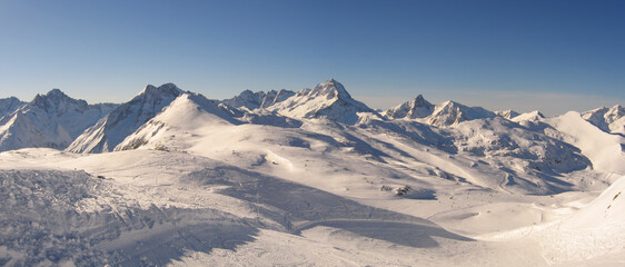 Panoramic view of the mountains of France on a winter sunny day. Haute Savoy, France. Snow Park.