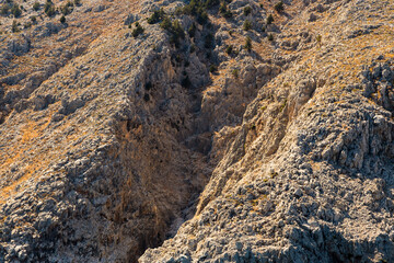 Rock formation showing layers of textured sedimentary rock