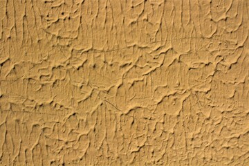 evocative image of yellow painted wall texture