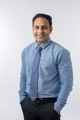 Portrait of handsome young businessman isolated on white background