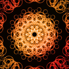 Abstract fractal background with a mandala made of luminous ring on a dark background.