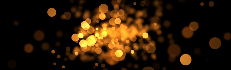 Abstract glitter gold and yellow bokeh glow in the dark on black background. Christmas banner...