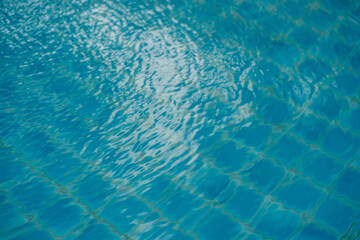 Pure blue water the pool. Water caustic background