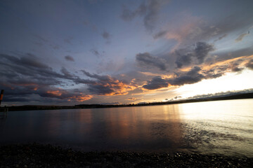 Fototapeta na wymiar Sunset at lake tekapo shore