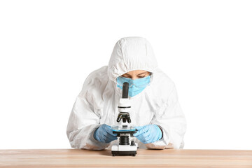 Scientist working with microscope against white background