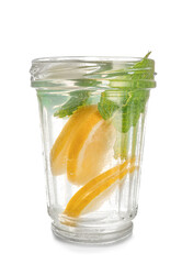 Glass of fresh lemonade on white background