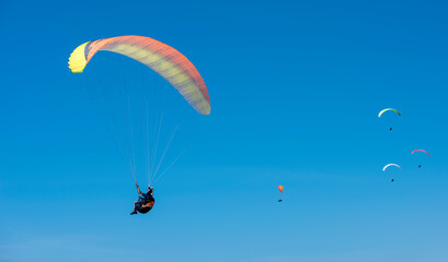 Para glider on a background of blue sky