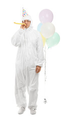 Asian man in biohazard suit and with Birthday party decor on white background. Concept of epidemic