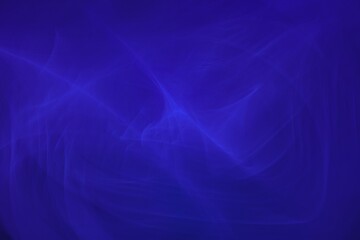Blue glowing background. Abstract background for design. Suitable for wallpapers and posters, web, cards, etc.
