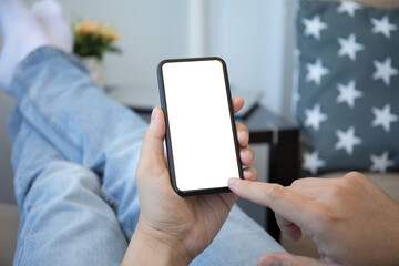 male hands holding phone with isolated screen in the room