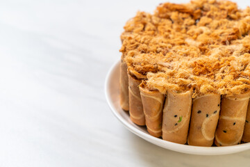 crispy coconut roll with dried shredded pork