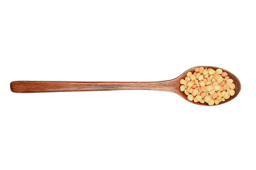 Wooden spoon and peas on an isolated background