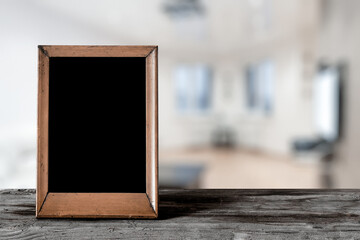 photo frame on the wooden table