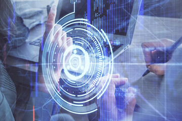 Double exposure of man and woman working together and technology theme drawing hologram. Big data concept. Computer background.
