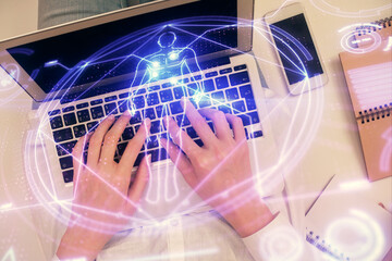 Double exposure of woman hands working on computer and education theme hologram drawing. Top View. Science concept.