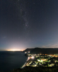 Night view from Bald Hill lookout with starry sky.