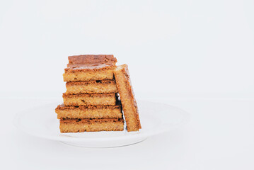 Stack of delicious freshly baked blondie brownie dessert slices.