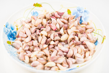 Unpeeled Odor Garlic, A Herbal Food Cooking Material in the dish.