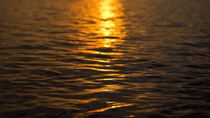 Water surface at sunset time abstract nature background