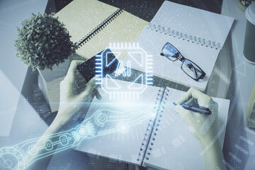 Double exposure of woman on-line shopping holding a credit card and data theme hologram drawing. E-commerce concept.