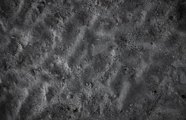 Wet sand surface ground after water. Lock down shot