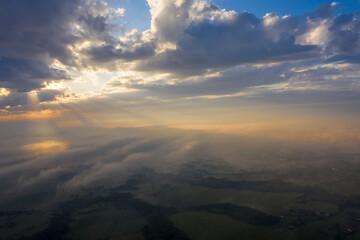 aerial view of Sunrise among forests, meadows and fields