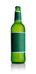 Cold frosted green bottle of beer with blank label on white background for print design and mock up