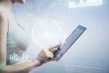 Double exposure of technology sketch hologram and woman holding and using a mobile device.