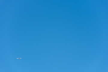 Fototapeta na wymiar Background with airplane in the sky