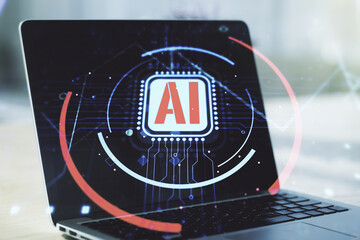 Double exposure of creative artificial Intelligence abbreviation with computer on background....