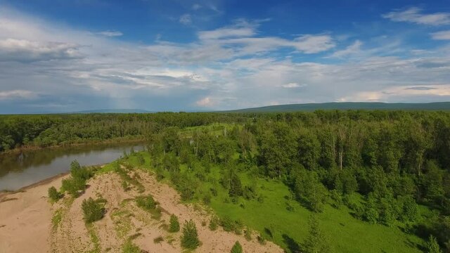 Aerial landscape with small winding Sim river in Russia, 4k