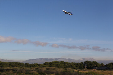 Fototapeta na wymiar Beautiful scenery and airplane takeoff from the airport. Mallorca, Spain. Balearic Islands
