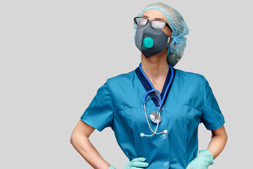 female doctor with stethoscope wearing protective mask and latex gloves over light grey background