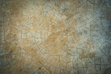 Yellow cracked plaster wall for background