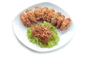 Fried chicken Fried lemongrass isolated on white background. With clipping path.