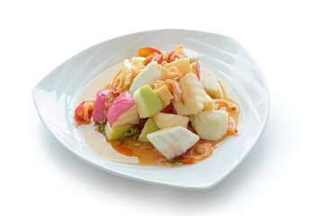 Fruits salad and vegetable in dish isolated on white background. With clipping path..