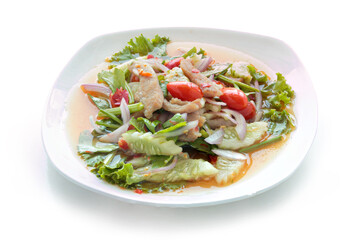 Grilled Pork Neck Salad Thai food served. Hot and Spicy Slice grilled pork menu Asian food isolated on white background. With clipping path.