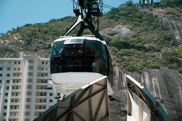 View of the Sugar Loaf in Botafogo, a mountain, and a landscape of Rio de Janeiro from a cable car,...