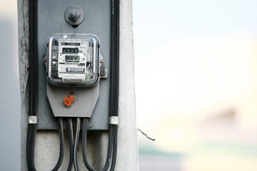 Fototapeta na wymiar Electricity meter on electric pole on 2020 April, 4 in Bangkok Thailand